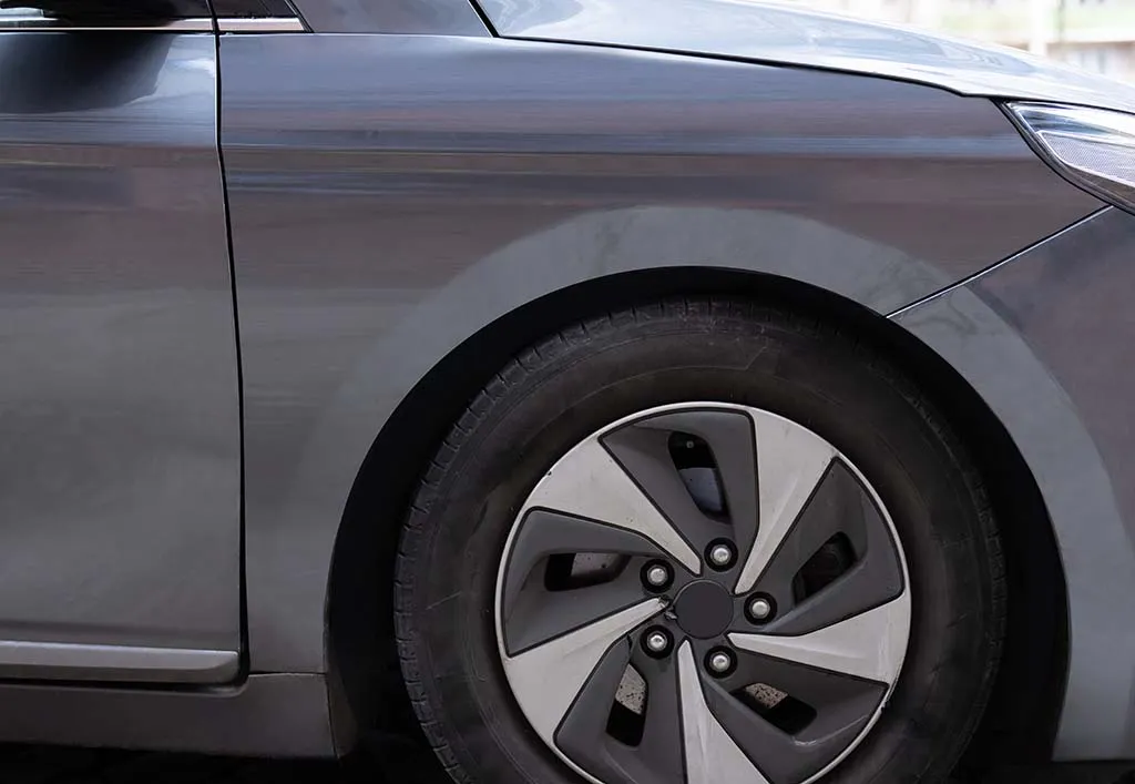 The same vehicle after Fine's Body Shop repaired the collision damage, smooth, factory-match finish